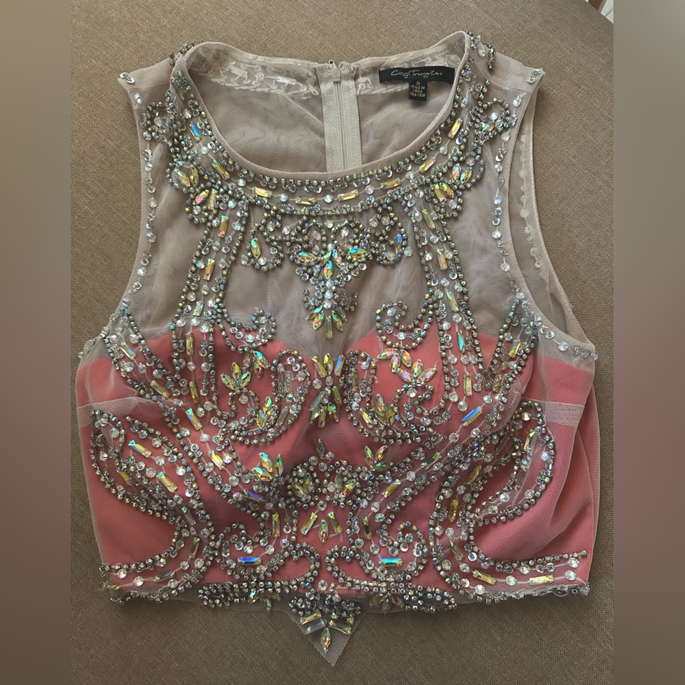 Embroidered jewelry top.